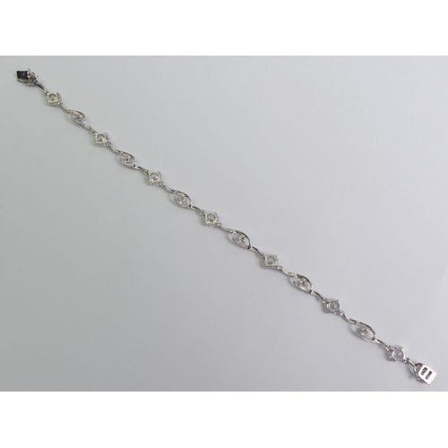 50 - 9ct white gold CZ and diamond bracelet 5.4 grams, 18.5cm x 5.6mm.