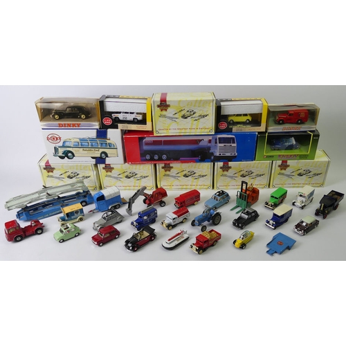 371 - A quantity of boxed and un-boxed Matchbox, Dinky and Corgi vehicles.