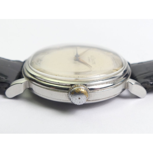 155 - Le Coultre gents stainless steel bumper automatic movement watch. 36 mm wide including the button.
C... 