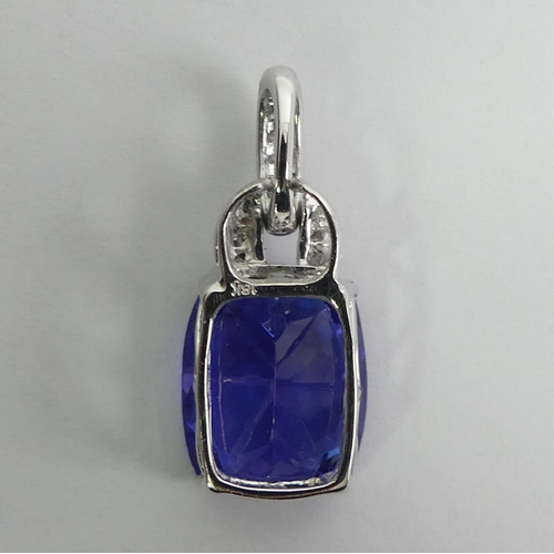 117 - 18ct white gold tanzanite and diamond pendant, 5.4 grams, tanzanite 12.2mm x 14.5mm, pendant length ... 