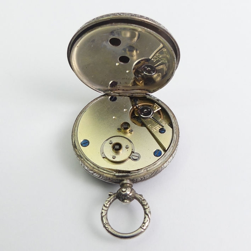 130 - Silver fancy dial open face key wind pocket watch, 39mm x 58mm.
Condition Report: In working order.