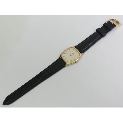 144 - Gents boxed gold tone Omega quartz watch on a black leather strap (after market strap), 32mm inc. bu... 