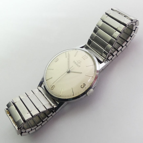 149 - Gents Tissot manual wind stainless steel watch with box and paperwork, 35mm inc. button.
Condition R... 