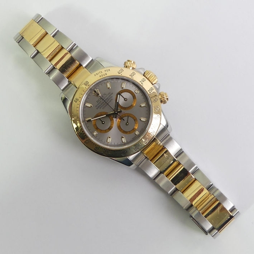 150 - Rolex Cosmograph Daytona stainless steel and gold, grey dial watch. The strap with an extra link, bo... 