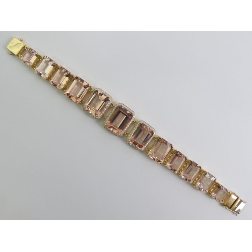 14 - 18ct gold graduated morganite and diamond set bracelet, 65.7 grams, 19.5cm x 21.3mm at widest point,... 