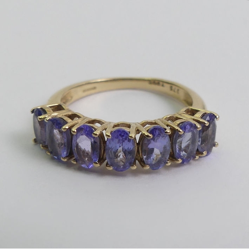 17 - 9ct gold tanzanite seven stone ring, 2.1 grams, 5.1mm, size J 1/2.