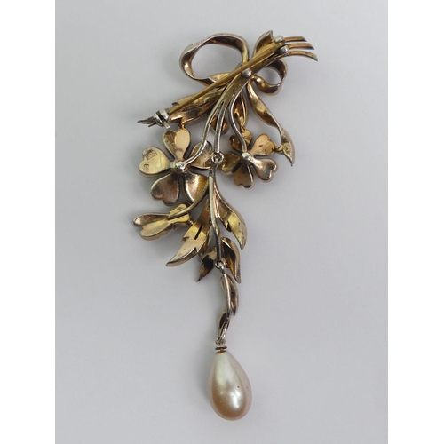 18 - Sterling silver crystal set and faux pearl articulated floral design brooch, 32 grams, 90mmx 55mm.