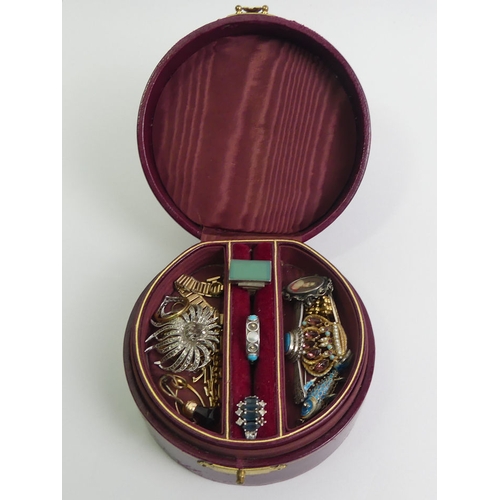 2 - A leather jewellery box and contents including a silver and chrysoprase ring.