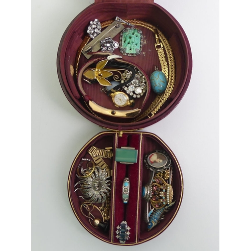 2 - A leather jewellery box and contents including a silver and chrysoprase ring.