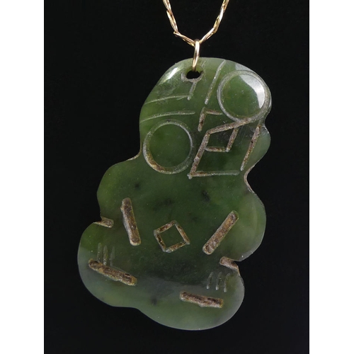 22 - New Zealand Jade tiki pendant and 9ct gold chain, 2.6 grams, tiki 40mm x 26mm, chain 48cm.