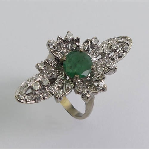 27 - 12ct white gold emerald and diamond ring, 5.8 grams, 30.8mm, size K.