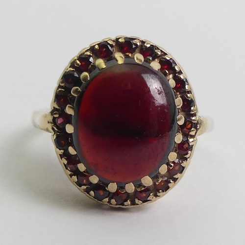 3 - 9ct gold garnet ring, 5 grams, 16.6mm, size N.