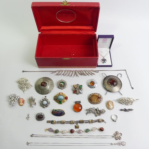 4 - A jewellery box and contents including silver items.