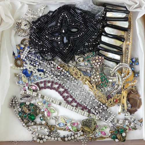 45 - A box of costume jewellery including crystal bracelets.