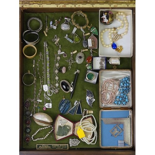 46 - A stall holders display cabinet and contents including a peridot bracelet and silver pendants, 41cm ... 