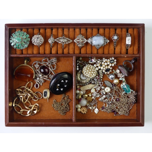 47 - A leather jewellery box and contents including silver rings.