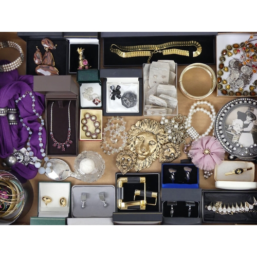 64 - A box of mixed costume jewellery including a quantity of silver earrings.