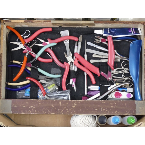 65 - Two cabinets containing jewellery repairing items along with various tools.