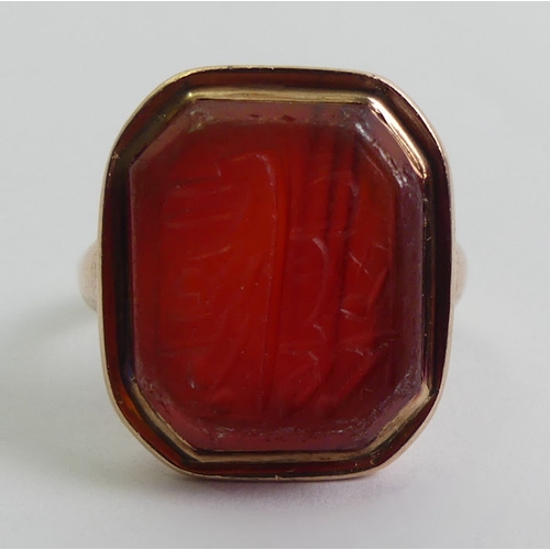 74 - 9ct gold carnelian intaglio seal ring, 5.8 grams, 18.9mm, size O.