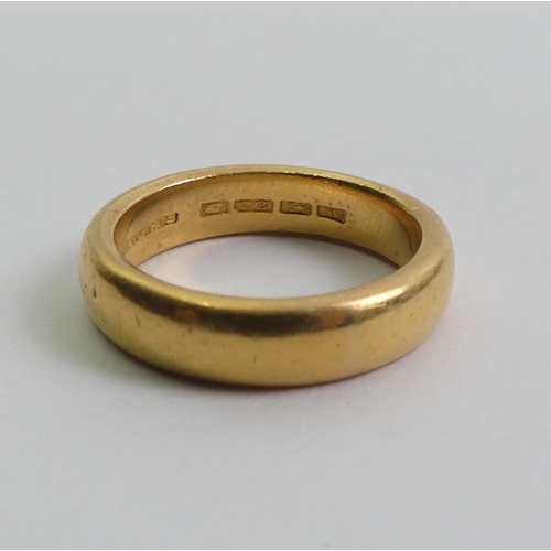 75 - 22ct gold wedding ring, Birm. 1921, 7.7 grams, 4.6mm, size K.