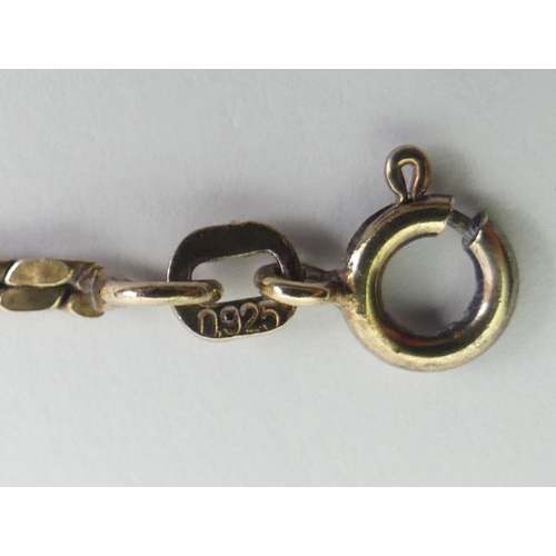 81 - A silver vermeil snake design bracelet, 6.5 grams.