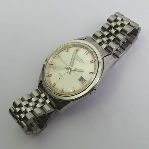 127 - Gents Seiko stainless steel automatic date adjust watch, 38.2mm in diameter.
Condition Report: In wo... 