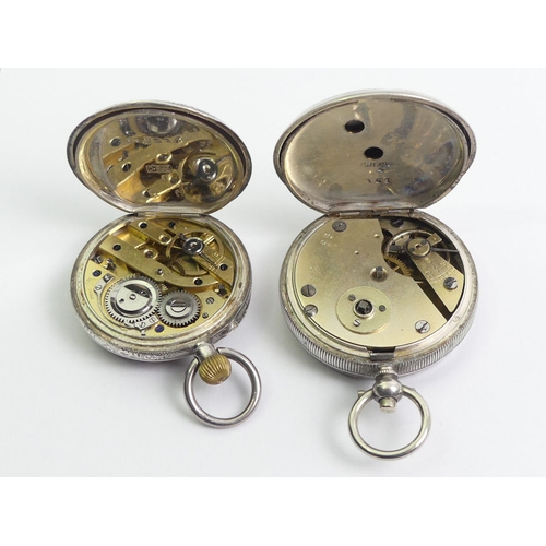 128 - Two fancy dial silver open face pocket watches, largest 54 x 37mm.