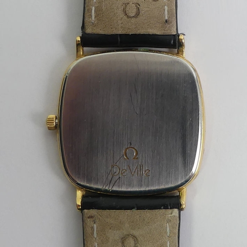 144 - Gents boxed gold tone Omega quartz watch on a black leather strap (after market strap), 32mm inc. bu... 