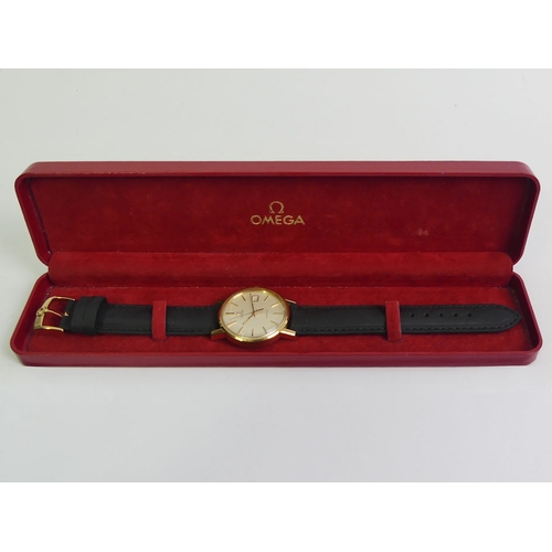 145 - Gents Omega gold tone quartz date adjust watch on a black leather strap and in a fitted box, 37mm in... 