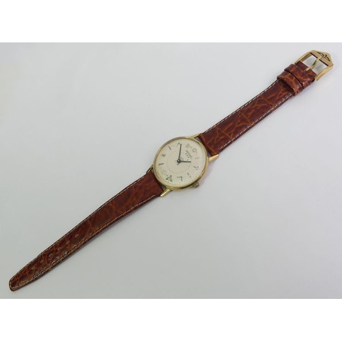 142 - Bernex masonic dial manual wind gold tone gents watch on a brown leather strap, 36mm inc. button.