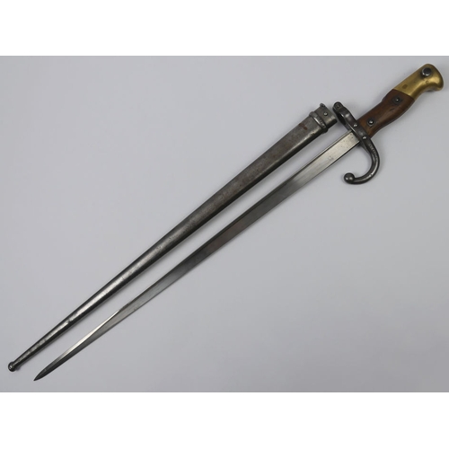 202 - French pre-WWI bayonet and scabbard, the blade marked 1879 and named, blade 52cm.