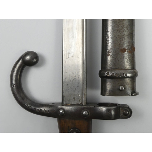 202 - French pre-WWI bayonet and scabbard, the blade marked 1879 and named, blade 52cm.