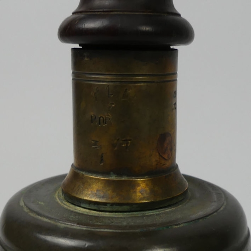 215 - World War military issue hand bell, 27cm high.