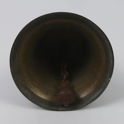 215 - World War military issue hand bell, 27cm high.