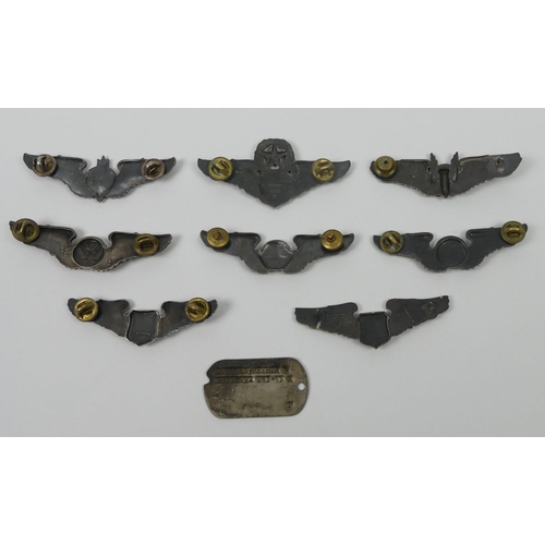 222 - Eight US WWII aircrew wings, clutch backs and a dog tag to Nielson Arthur, each approximately 75mm l... 