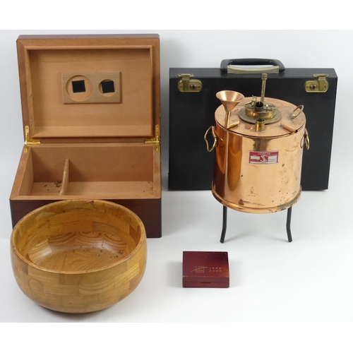 294 - A walnut humidor, copper drum, compass, writing slope and a wooden bowl.