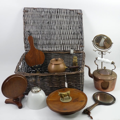 295 - A picnic hamper and contents including a miniature tilt-top table, mirrors and bellows.