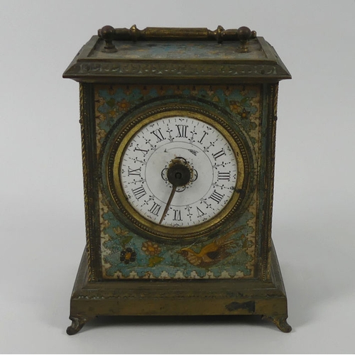 316 - Ornately decorated brass mantle clock from the 19th century, 19.5cm to top of handle.