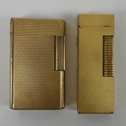 321 - Dunhill gold plated lighter along with a Dupont example.