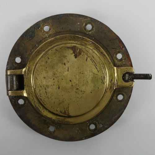 328 - A brass ships port hole, 26cm.