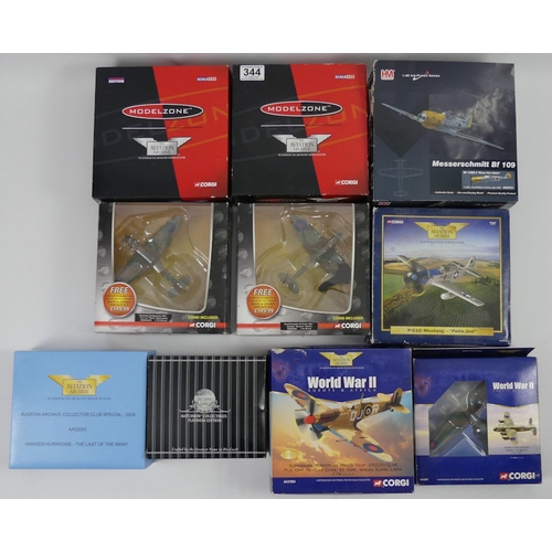 344 - A box of diecast planes including Corgi, Oxford Diecast, various scales.