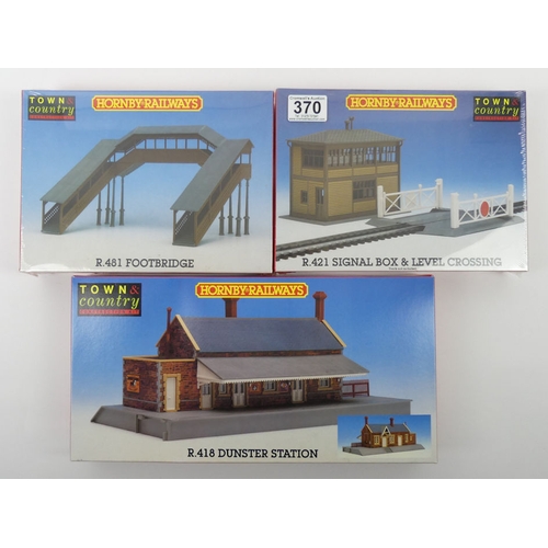 370 - Three boxed Hornby Town & Country construction kits, R421 signal box and crossing R481 Dunster Stati... 