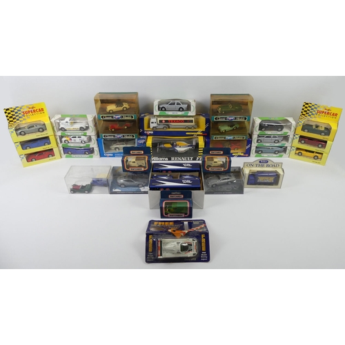 374 - A box of boxed diecast cars including Corgi James Bond Aston Martin DB5, Corgi classic models.