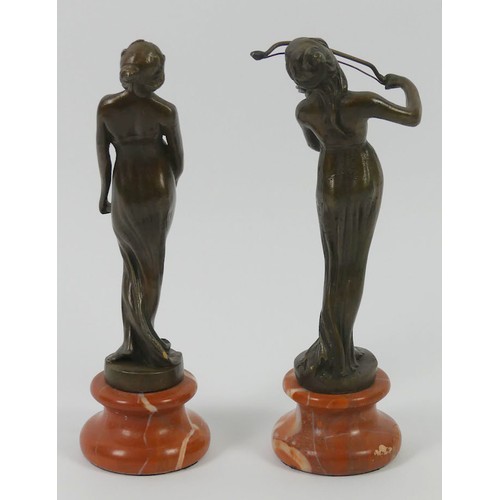 318 - A pair of Art Nouveau style bronze figures on marble socles, 20cm.