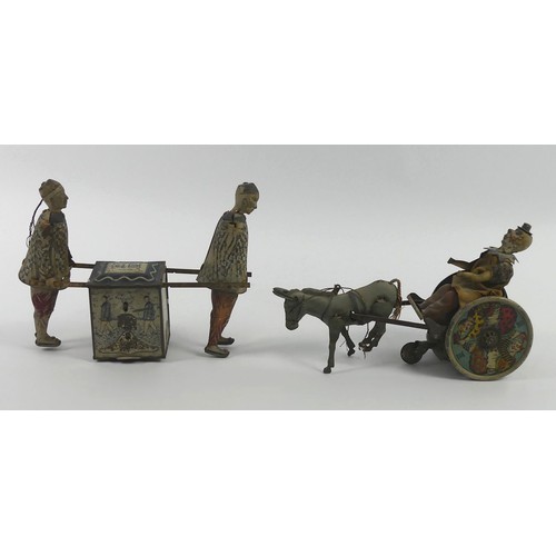 343 - An early 20th Century DRGM clockwork tin plate horse and trap with clown driving together with a tin... 