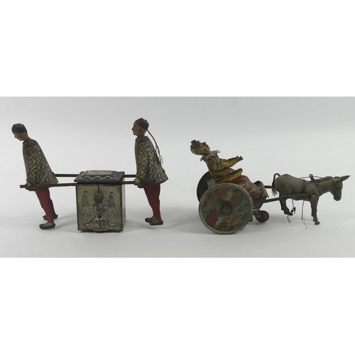 An early 20th Century DRGM clockwork tin plate horse and trap with ...