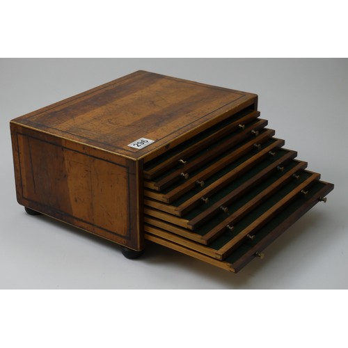 296 - A 19th century coin collectors cabinet and three folders of GB coins along with a tin of old pennies... 