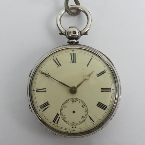 136 - Victorian silver open face pocket watch with buckle and belt design Albert chain and car fob.