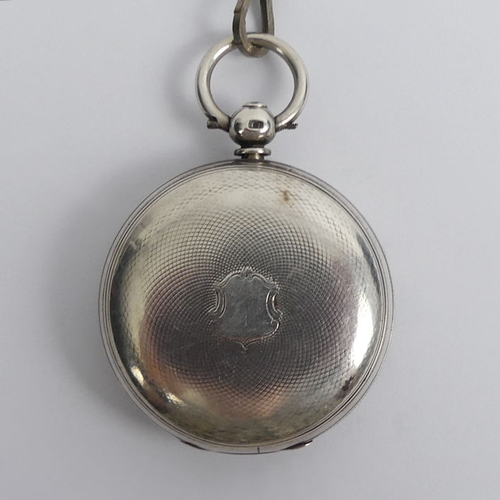 136 - Victorian silver open face pocket watch with buckle and belt design Albert chain and car fob.