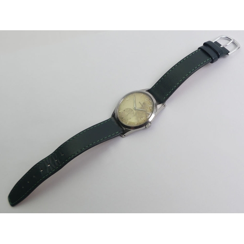 138 - Gents Omega manual wind, stainless steel 'Jumbo' watch on a green leather strap, 37mm inc. button.
C... 